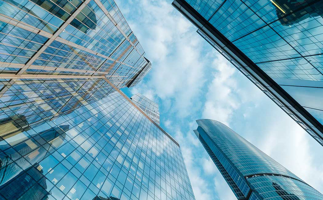 view of buildings looking up to the sky, AWS | DXC Technology