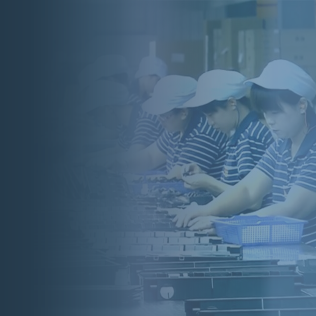 Female factory workers quality testing GPI printer cartridges, IT services for manufacturing companies, GPI | DXC Technology Customer Stories 